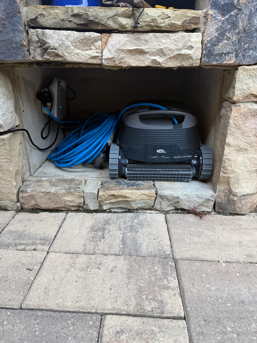 Dolphin Quantum Pro wall-mounted power supply and coiled cord storage